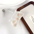 White pearlescent cat claw clip with gold wire feline details and acetic acid finish - Off White