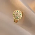 Octagonal vintage gold ring with green gems and square zirconias on satin - Hexagonal Inlaid Green Gem Style (J0098)
