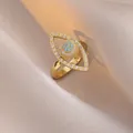 Golden evil eye ring with blue center bead and white rhinestones on champagne satin - Evil Eye Gold Style (J0286-1-2) / Gold
