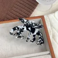 Elegante molletta per capelli in acetato marmorizzato bianco e nero con design a fiocco - 9.8cm / Bianco e Nero Picchiettato