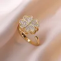 Verstellbarer Goldring mit funkelndem Kleeblatt-Design und mikrobesezten Zirkonia-Kristallen - Kleeblatt Drehender Ring