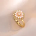 Pink and white daisy flower ring with micro-pave zircons and small pearl accent - 12-Petal Rotating Flower Ring (J0144)