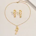 Vue détaillée de l'ensemble collier et boucles d'oreilles cœur style or liquide - Style Courbe Abstraite Or Liquide (XL5743)