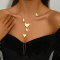 Elegant multi-layered gold heart pendant necklace for women on a fine metal chain - Golden Multi-Heart Long Necklace (XL5590)
