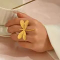 Exaggerated golden dragonfly open ring with textured wings worn on hand for women - Vivid Wing Texture Dragonfly Style (JZ1312-3)