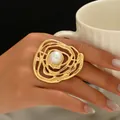 Irregular gold swirl ring featuring a large white pearl in an artistic wave design - Gold Swirl Line Style (JZ1296-7)