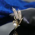 Golden wheat stalk brooch with sparkling crystals and a white faux pearl accent - Silver Wheat Ear