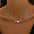 Detailed view of silver snake chain necklace featuring a white pearl and metallic beads - Silver Style (XL5417-4)