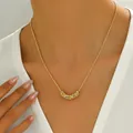 Close-up of elegant gold collar necklace with crystal-encrusted curved pendant on model - Curved Inlaid Style (XL5565)