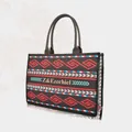 Bohemian black tote bag with red geometric diamond patterns and brown leather handles - Large