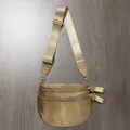 Detail of tan checkerboard crossbody bag with three golden zippers and wide nylon strap - Solid Brown