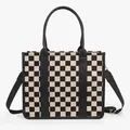 Close-up of black and white checkerboard tote bag with premium leather handles and straps - Large Plaid Black
