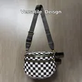 Checkerboard crossbody bag with dual golden zippers and adjustable black strap - Black White Grid