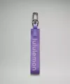 Cordino intrecciato viola scuro con moschettone in metallo argentato e logo - Viola