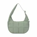 Detail of light green quilted nylon shoulder bag showing puffy square stitching and zipper - Green