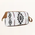 Detail view of ethnic geometric pattern toiletry bag with leather trim and fabric handle - White Black Tribal Pattern (White)