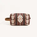 Detail view of Bohemian PU leather toiletry bag with ethnic patterns and side strap - Coffee