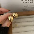 French vintage polished gold bean earrings with a bright mirror finish and chic dome design - Glossy Arc Style (D0402)