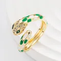 Adjustable gold punk snake ring with green enamel dots and sparkling crystal eyes - Open Adjustable / Verdant