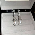 Elegant silver teardrop pearl earrings with zircon inlay in a black jewelry box - Water Drop Pearl Drop Style (D0696)