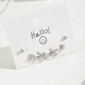 Silver star and bow cubic zirconia stud earring set of three pairs on white card display - Star Bowknot Round Zircon Silver Style (EH4591-6)