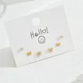Three-pair gold bow and zircon stud earring set on a white minimalist display card - Single Zircon Bow Style (EH4594-2)