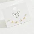 Elegant 6-piece gold earring set with bow designs and zircon studs on a white card - Hollow Bow Round Zircon Style (EH4594-6)
