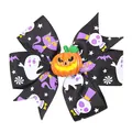 Detail of Halloween bow hair clip featuring ghost prints and an orange pumpkin charm - Black Ghost Pumpkin (9)
