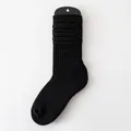 Schwarze Strick-Stulpen für Damen und Herren mit geripptem Design und weichem Stoff - Einheitsgröße / Schwarz