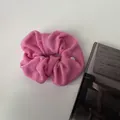 Soft rose pink plush scrunchie in textured towel fabric with silver metal charm detail - Rose Red
