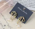Pendientes dorados barrocos de estilo lava con elegantes perlas naturales de agua dulce - Diseño De Arco Barroco E2120