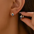 Orecchini a cerchio dorati a forma di zampa con zircone blu a cuore incastonato - Oro (EH4405-2)