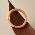 Detailed macro view of pink resin tube bracelet with gold metal spacer rings - Pink Marble Style (AB0091-5)