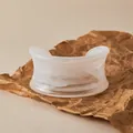 Detail of wide acrylic cuff bracelet with white marble resin texture and open design - White Marble Style (AB0090-1)