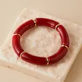 Dettaglio di perline in acrilico rosso marmorizzato bohémien e distanziatori dorati - Rosso Marmorizzato (AB0079-11)