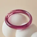 Close-up of bohemian purple resin bangle with marbled texture on minimalist stand - Purple Swirl Style (AB0093-4)