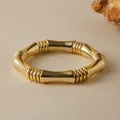 Brazalete bohemio dorado con diseño de bambú y acabado vintage pulido - Estilo Roscado de Bambú Biónico (AB0070-5)