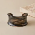 Macro view of wide acrylic open cuff bracelet featuring smoky brown marble texture - Smoky Brown Marble Style (AB0090-12)