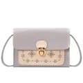 Bolso bandolera de mujer en gris púrpura y beige con detalles calados florales - Gris claro
