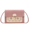Mini sac bandoulière rose et beige avec motif ajouré floral et fermoir rotatif doré chic - Rose