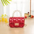 Red mini jelly handbag with quilted pattern, pearl handle and golden chain strap - Burgundy