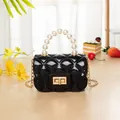 Mini black quilted jelly handbag with pearl handle and golden chain strap - Black