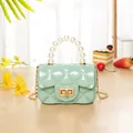 Mint green mini jelly bag with pearl handle, diamond quilt texture and gold chain strap - Light Green