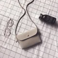 Beige litchi grain mini crossbody phone bag with gold snap button on plaid background - Light Gray