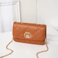 Brown quilted crossbody bag with gold interlocked ring clasp and metal chain strap - Brown