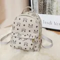 Creamy white small backpack with monogram pattern and adjustable straps for women - Off White
