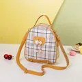 Mini plaid crossbody bag in ginger yellow with cat pearl hardware and long shoulder strap - Yellow