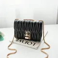 Chic black pleated texture crossbody bag with gold chain strap and square lock buckle - Black