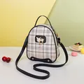 Plaid mini backpack in cream and brown with a cute pearl cat charm and black leather trim - Black