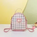Pink plaid mini backpack for women featuring cute cat pearl charm and crossbody strap - Pink